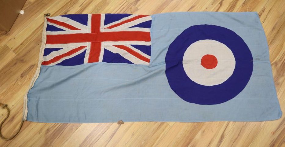 An RAF ensign flag, probably WWII and an Air Ministry metal trunk dated 1943